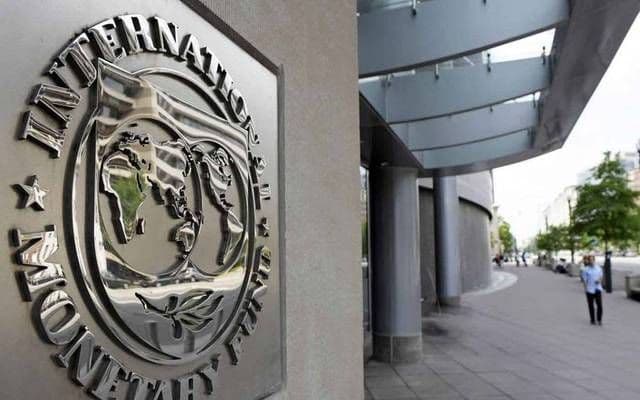 شعار صندوق النقد الدولي، يمثل العوامل الاقتصادية العالمية المؤثرة على السوق
