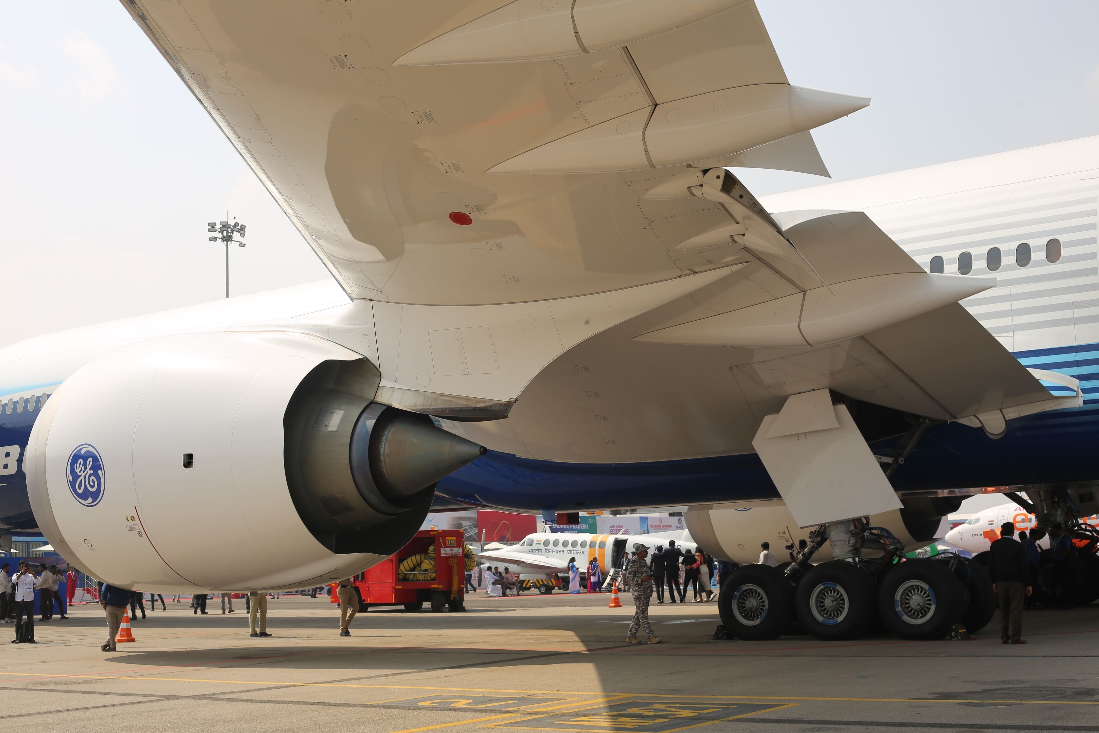 A close-up of the powerful GE9X engine on a Boeing 777-9, highlighting Cathay Pacific's investment in next-generation aircraft technology.