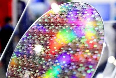 A close-up view of a silicon wafer, representing Taiwan's critical role in the global semiconductor industry.