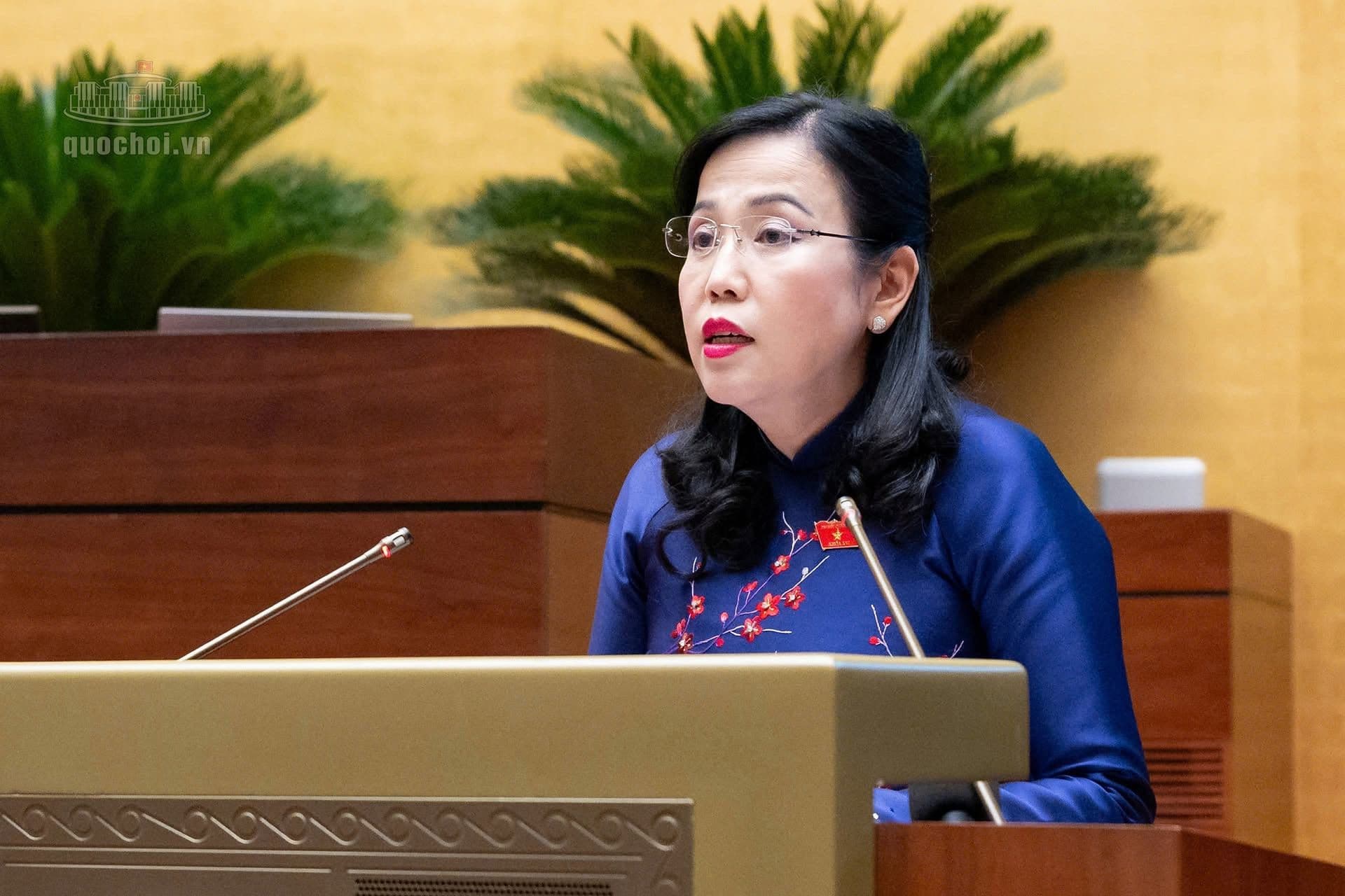 A government official participating in a formal legislative meeting.