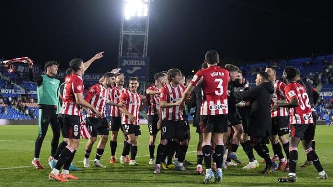A La Liga team celebrating on the field, symbolizing the league's global ambition and Villarreal's future identity.