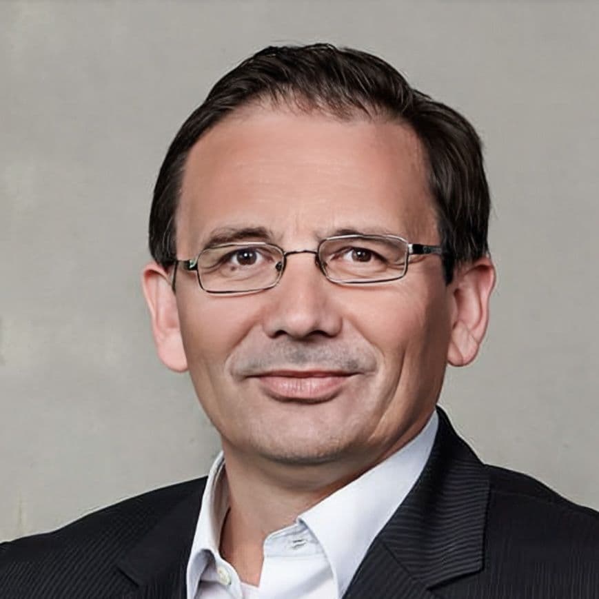 A professional man representing an investor or lender understanding BIM as the new language for real estate financing.