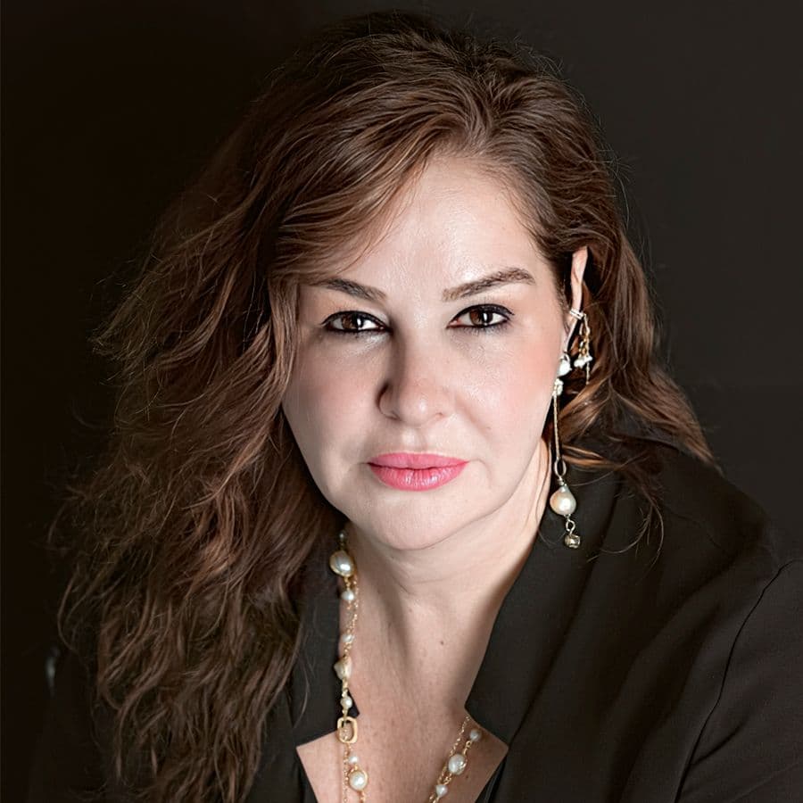 A professional woman representing a leader in de-risking real estate investments with BIM.