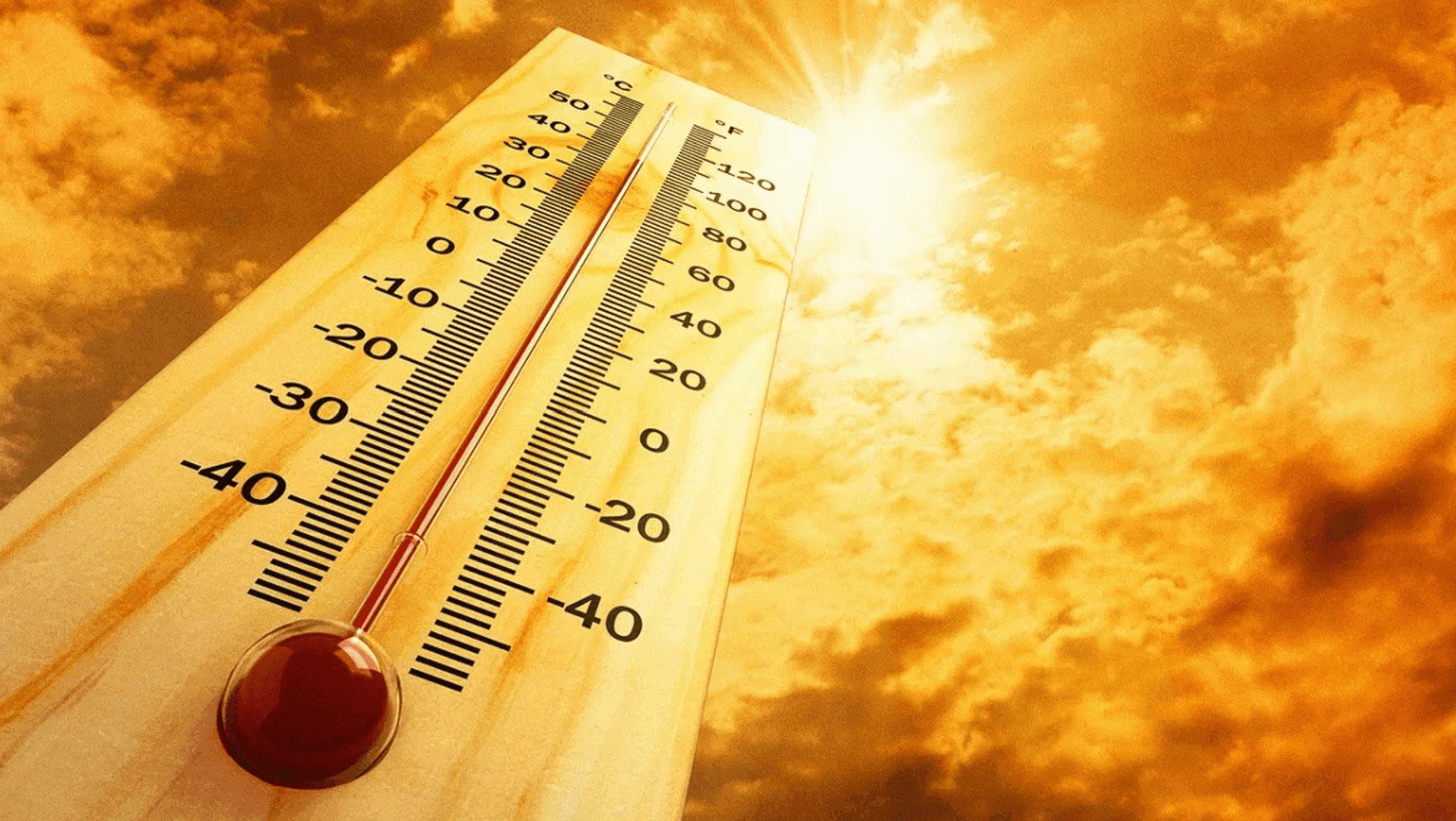 A thermometer showing high temperatures under a scorching sun, symbolizing Morocco's intense heatwaves and temperature fluctuations.