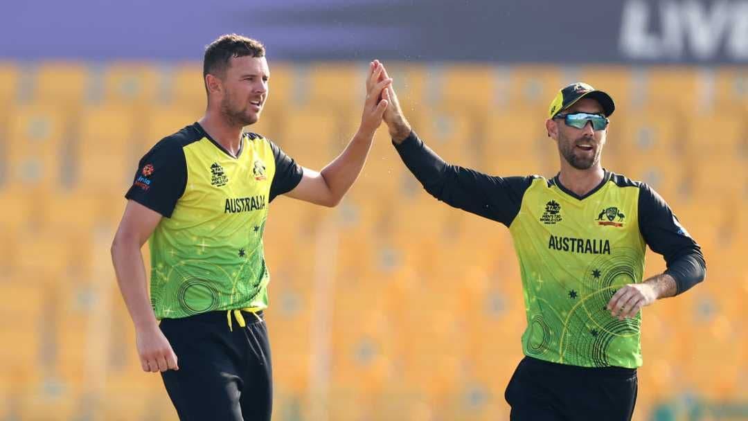 Australian cricketers Josh Hazlewood and Glenn Maxwell celebrating, reflecting the strategic depth and all-round talent shaping Australia's future cricket team.