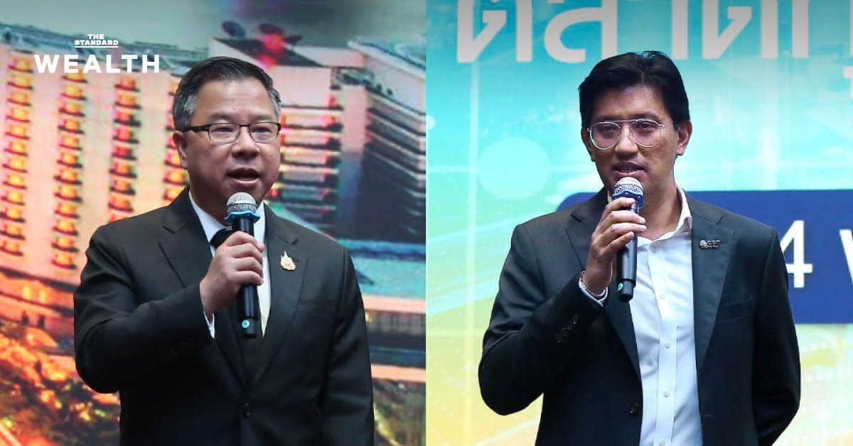 Business leaders speaking at a financial event, symbolizing corporate engagement and investment in the Thai market.