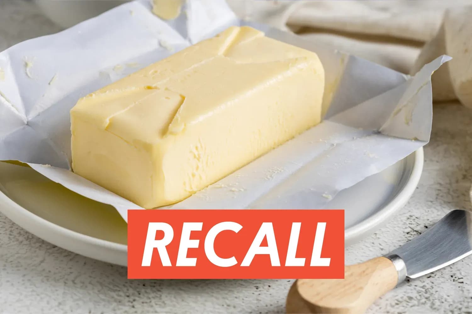 Butter stick with 'RECALL' warning for food safety alert