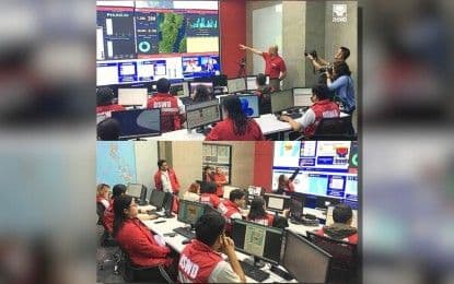 Centre de commandement du DSWD avec des écrans de surveillance, montrant la coordination des efforts de réponse aux catastrophes.