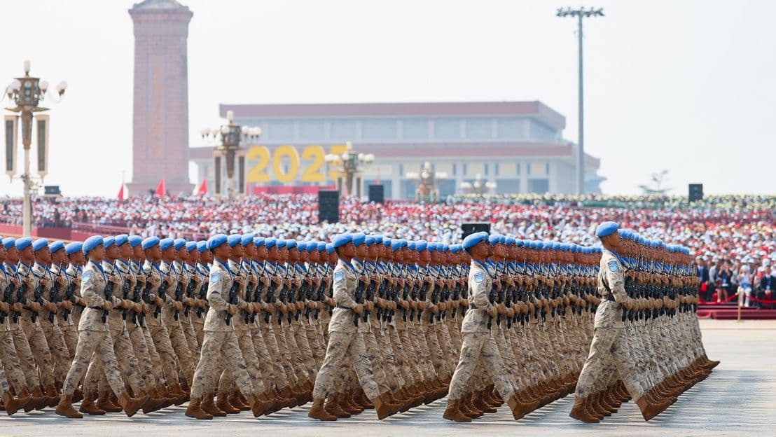 Chinese soldiers marching in formation during a military parade in Beijing.
