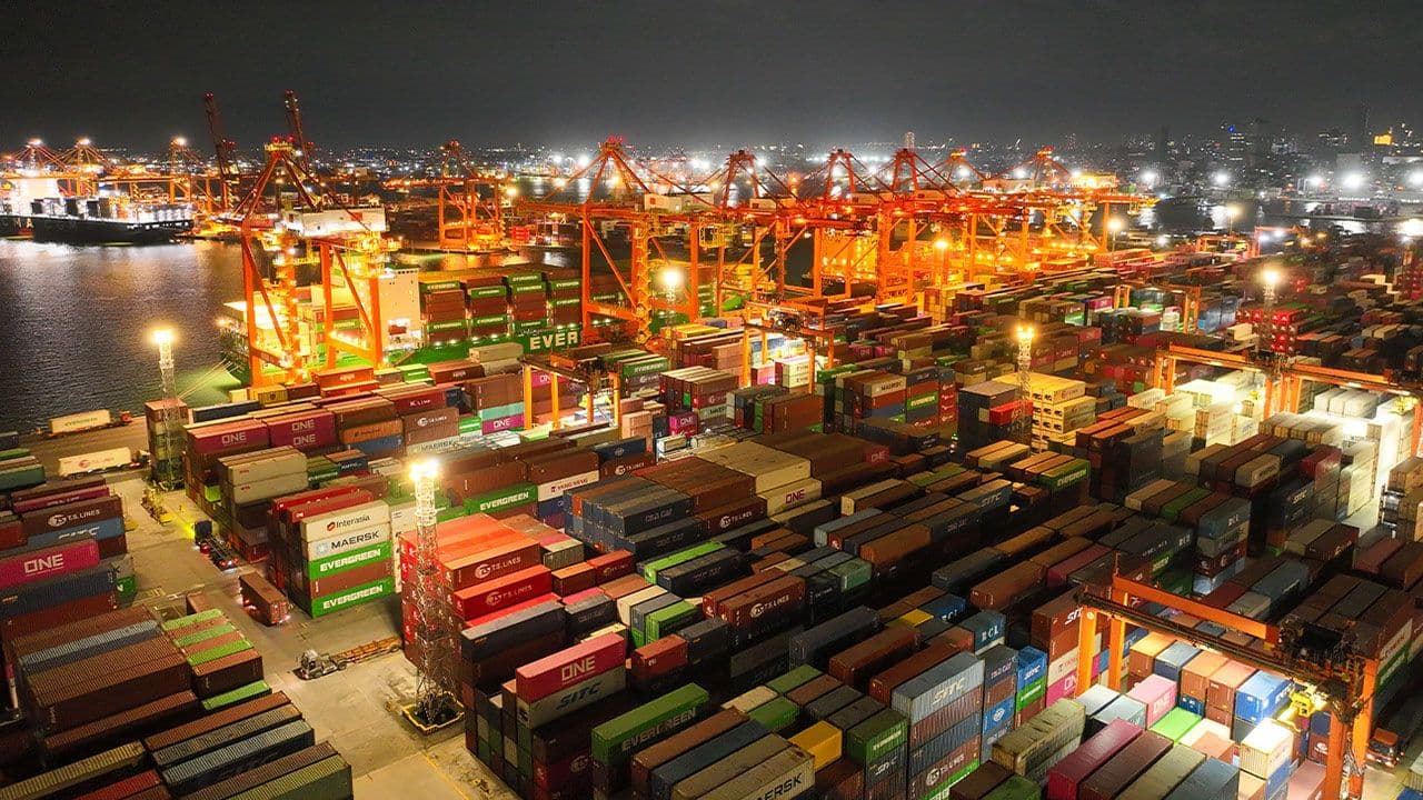 Container terminal at a major Philippine port, highlighting the logistics of agricultural commodity imports.
