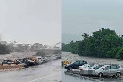 Des rues inondées à Taitung, Taïwan, transformées en rivières par des pluies torrentielles, avec des véhicules submergés.