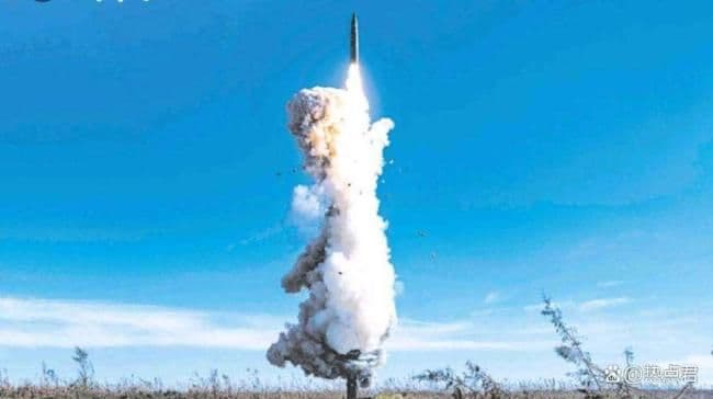 Excavator clearing mud and debris after a severe storm or landslide in China.