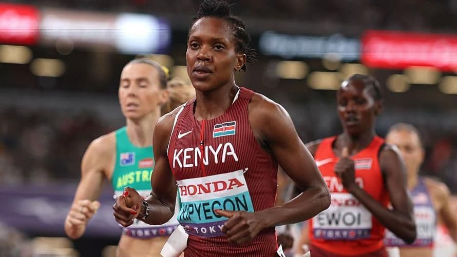 Faith Kipyegon running in the 1500m at the World Athletics Championships, representing the global stage of Gout Gout's Tokyo debut.