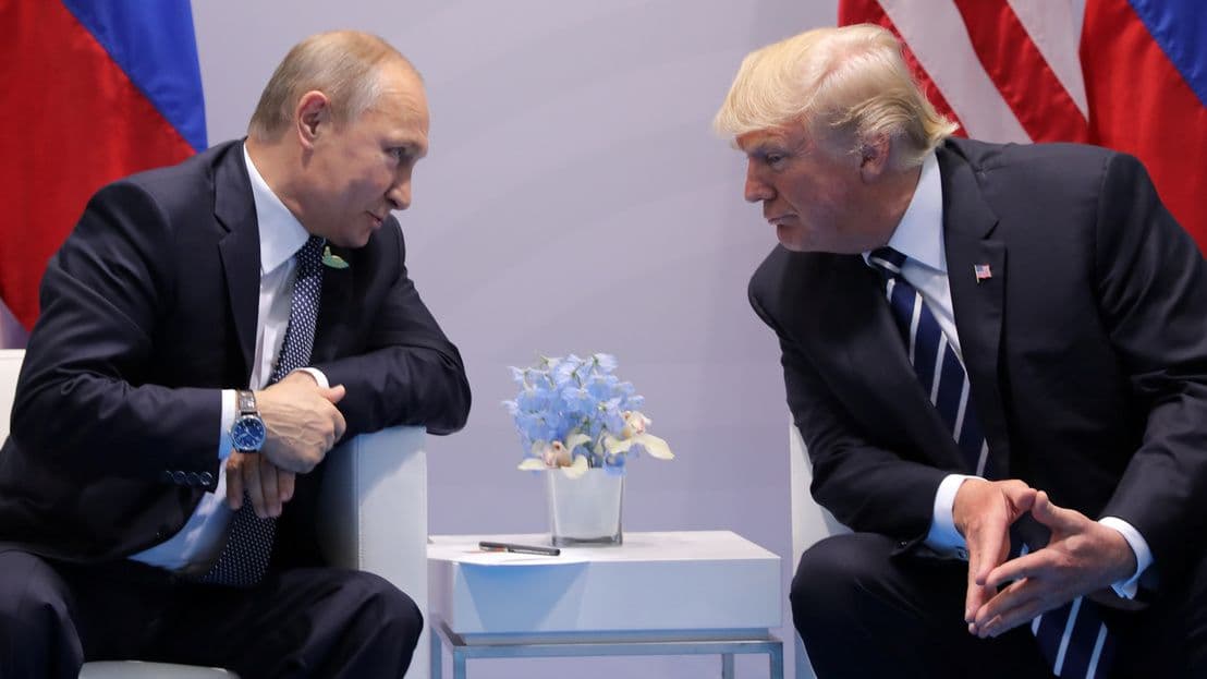 Former US President Donald Trump and Russian President Vladimir Putin in discussion, symbolizing Alaska's role in global geopolitical challenges.