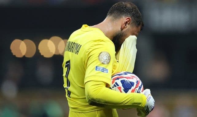 Gianluigi Donnarumma, PSG goalkeeper, looking dejected, symbolizing his exclusion from the Supercopa de Europa squad.