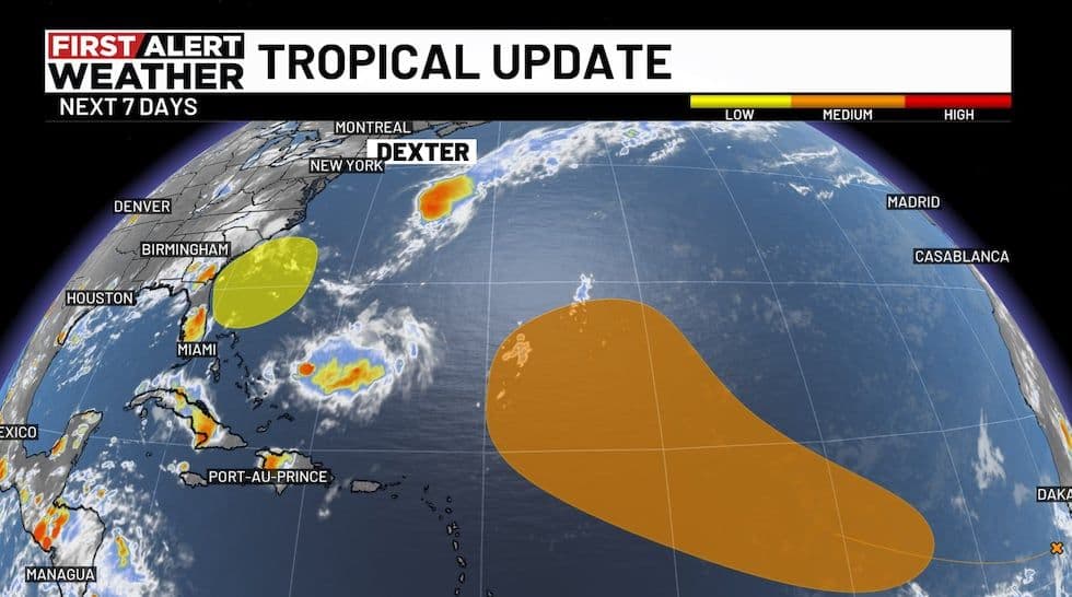 Global weather map showing tropical storm Dexter and other disturbances, highlighting areas of potential development.