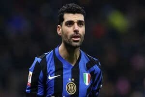 Mehdi Taremi in an Inter Milan jersey, representing his potential transfer to the club.