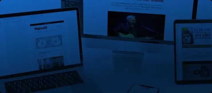 Multiple digital screens displaying data and information, symbolizing the advanced technology and data analytics used by Argentina's SMN for climate projections.