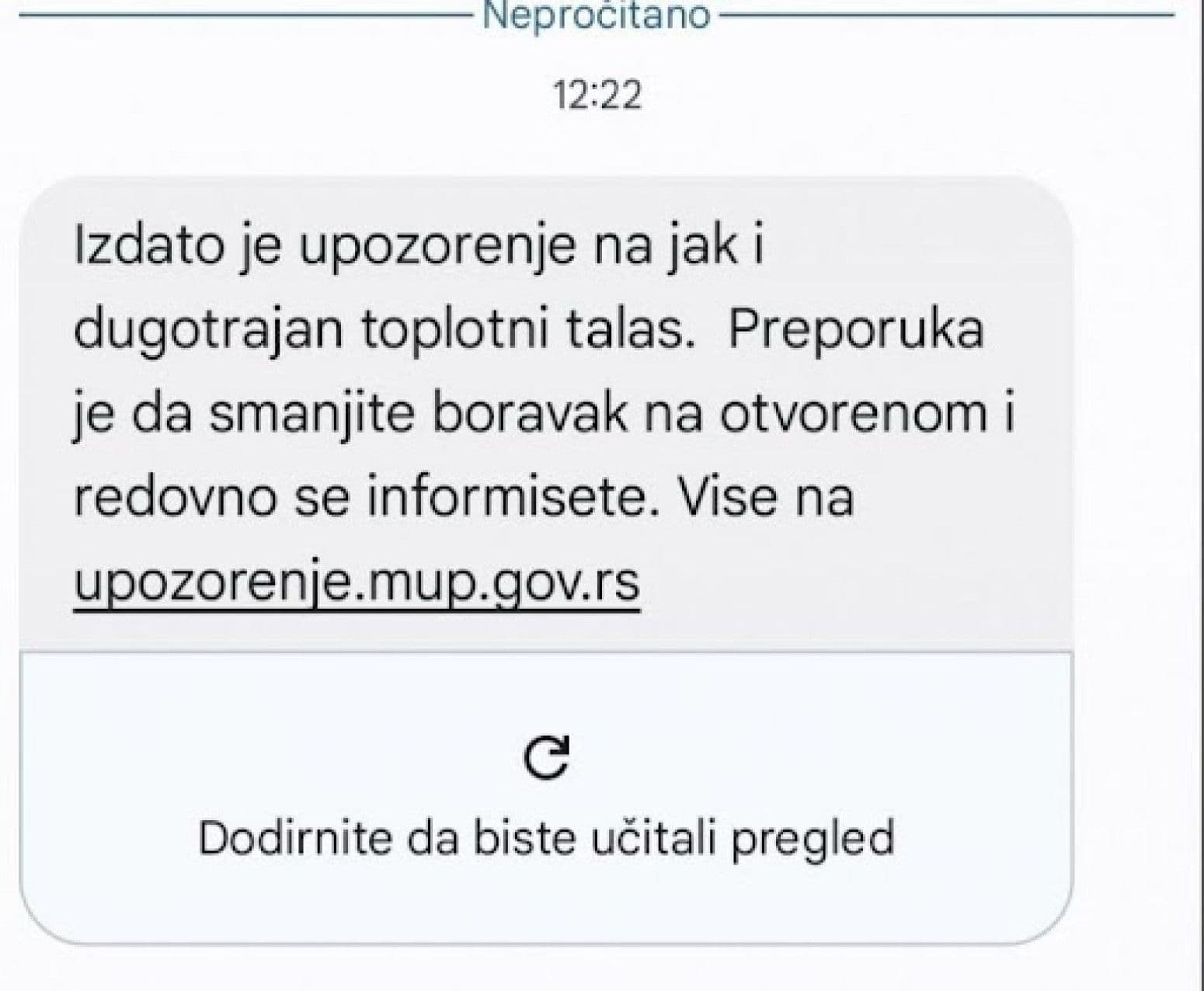 Official SMS warning from the Ministry of Internal Affairs (MUP) about a strong and prolonged heatwave in Serbia.