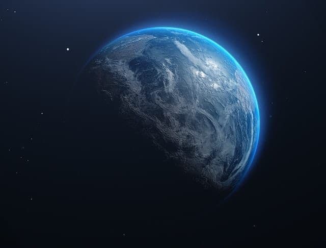 Planète Terre vue de l'espace, symbolisant les enjeux climatiques globaux.