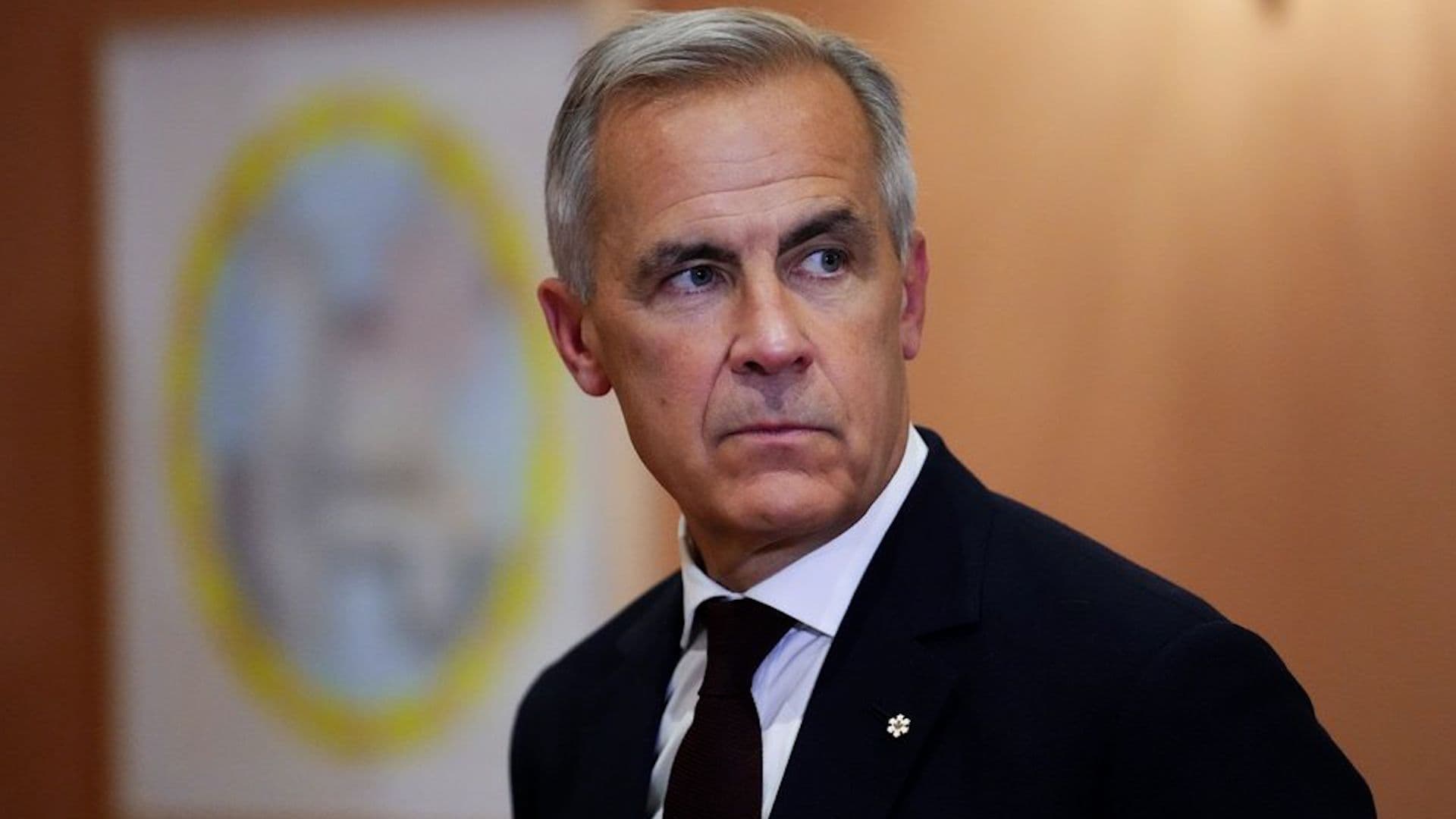 Prime Minister Mark Carney looking thoughtful, symbolizing the complexities of governance and policy decisions.