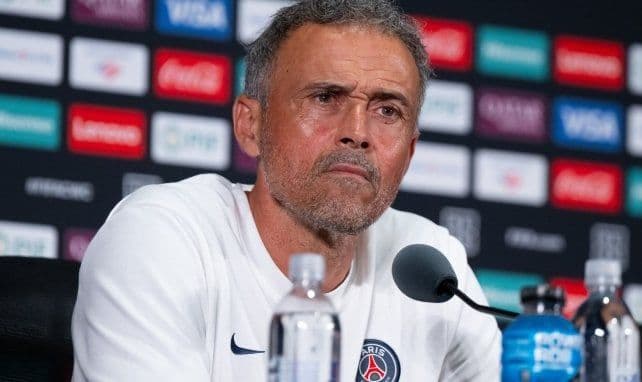 PSG coach Luis Enrique at a press conference, emphasizing his focus on team objectives and discipline.