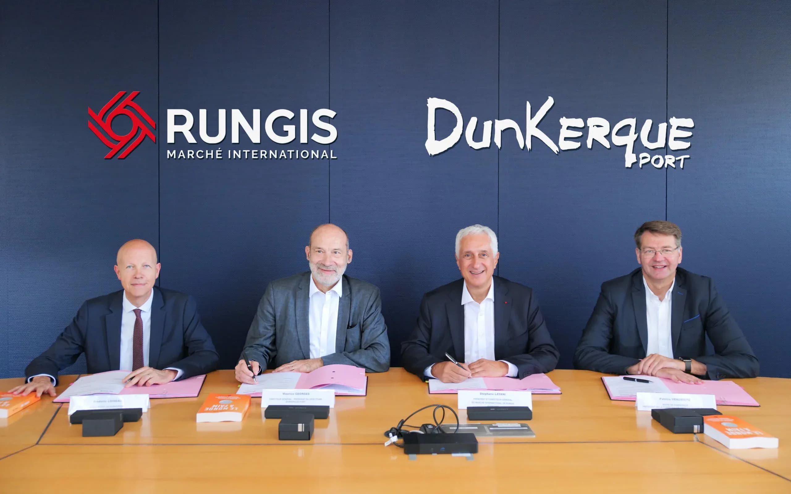 Representatives from Rungis International Market and Port of Dunkirk signing an agreement to develop a fresh fruit logistics hub.