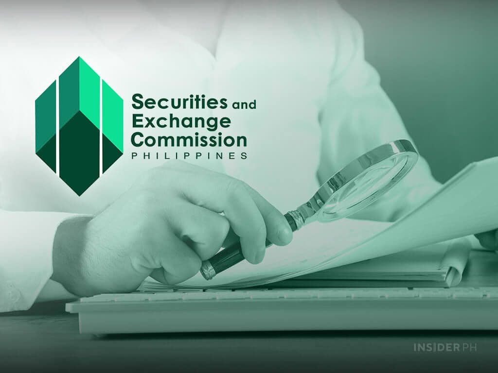 Securities and Exchange Commission Philippines logo with a hand holding a magnifying glass over documents, symbolizing governance, oversight, and strategic planning for a lasting legacy.