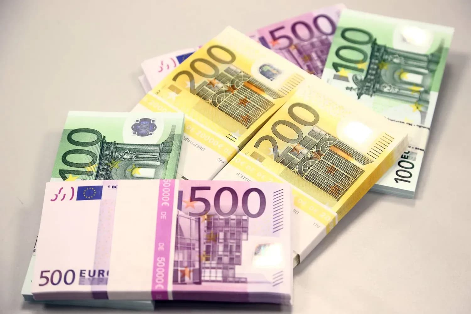 Stacks of Euro banknotes, symbolizing the future of European debt markets and the era of more expensive borrowing.