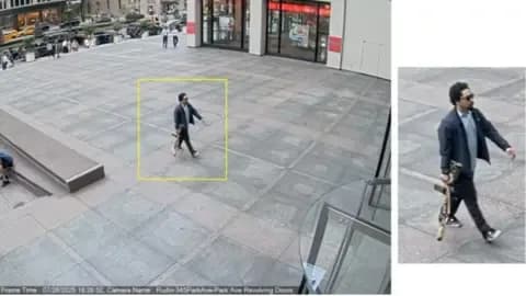 Surveillance video of a suspect with a rifle entering 345 Park Avenue, Blackstone's headquarters