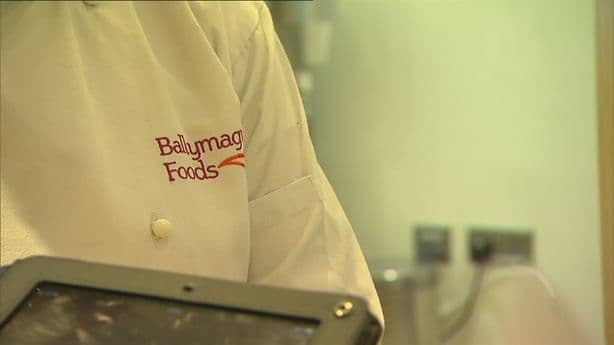 The Ballymaguire Foods company logo embroidered on a chef's jacket, highlighting the central producer in Ireland's ready meal recall crisis.