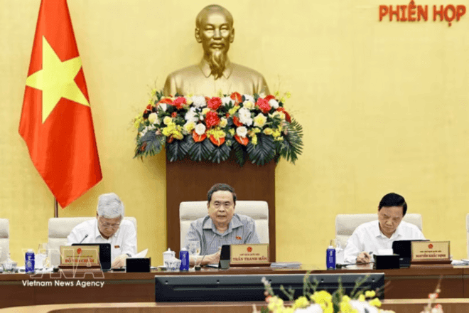 Vietnamese government officials during a legislative session at the National Assembly.