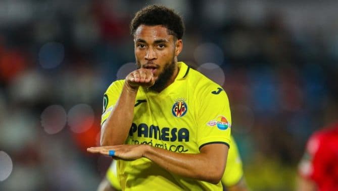 Villarreal player Arnaut Danjuma celebrating, representing the club's squad evolution and player movements.